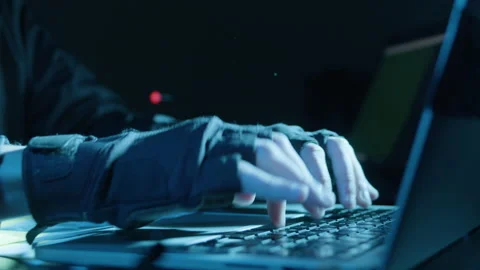 Closeup shot of human hands in fingerless gloves typing Stock Footage 181836071