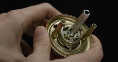 Closeup shot of inside of doorknob as man turns it Stock Footage 105474417