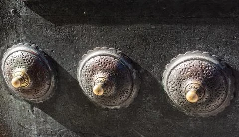 Closeup shot of knobs of an old building Fotos de archivo