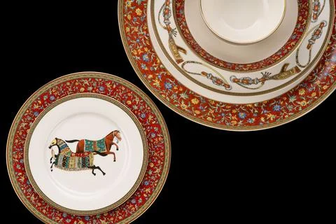 Closeup shot of luxury ceramic tableware isolated on the black background Stock Photos