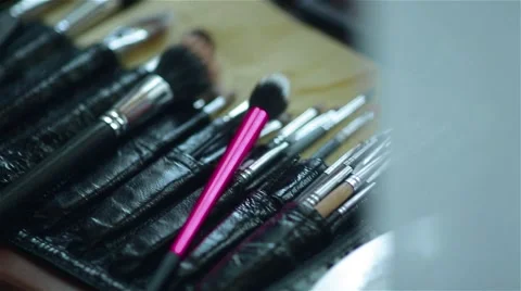 Closeup shot of make up brushes. Camera moving slowly shooting the kit. Stock Footage 62529393