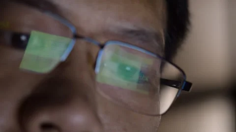 Closeup shot of man in glasses checking and analysis on laptop Stock Footage 40512282
