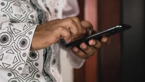 Closeup shot man hand using mobile phone and typing texting on messages. 스톡 동영상 301275299