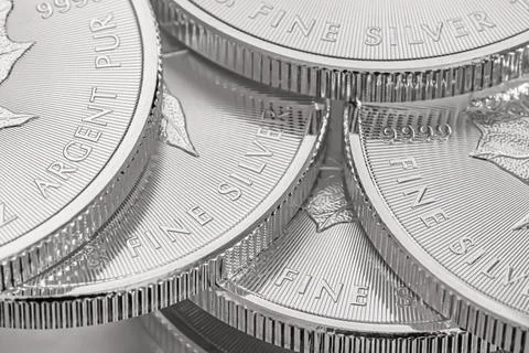 Closeup shot of maple leaf fine silver coins from the Royal Canadian Mint Stock Photos