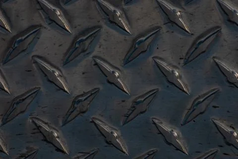 Closeup shot of a metal texture with sharp ornaments - perfect for background Stock Photos