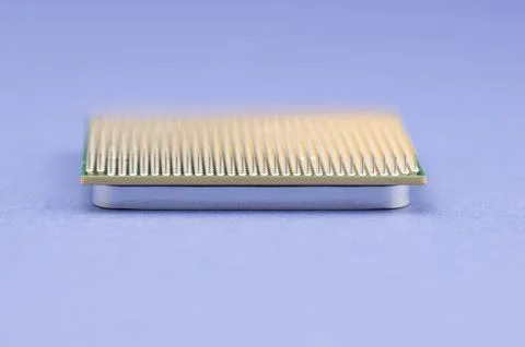 Closeup shot of microprocessor isolated on blue background Stockfoto's