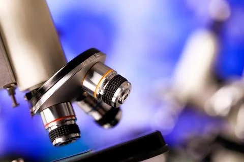 Closeup shot of microscope with selective lens objectives for various magni.. Stock Photos