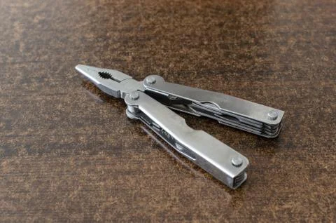Closeup shot of multifunction clamp on the table Stock Photos
