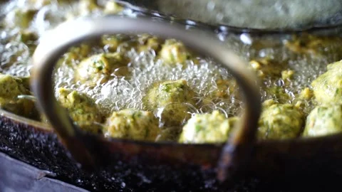 This is a closeup shot of one of the most famous Indian street food Frying .. 스톡 동영상 245377853