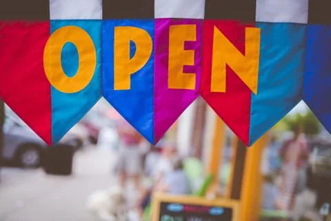 Closeup shot of an open flag with a blurred background Stock Photos