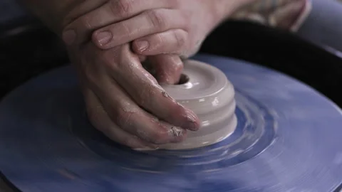 Closeup shot of potter's hands and clay Stock Footage 235465853
