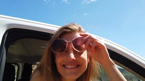 Closeup Shot of Pretty Blonde Model Taking Off Her Sunglasses 스톡 동영상 112022977