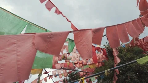 Closeup Shot of Red Buddhist Lungta Prayer Flag Waving in Wind, Yunnan, China Stock Footage 342708342