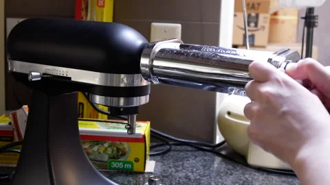 Closeup shot of rolling out the dough preparing homemade pasta Stock Footage 272598874