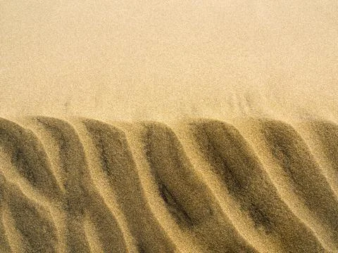 A closeup shot of the sand with parallel patterns in Gran Canaria, Canary Isl Fotos Stock