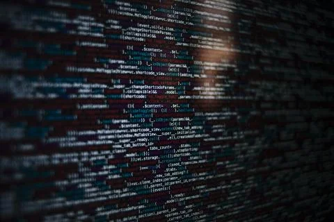 A closeup shot of a screen with HTML JavaScript source code for web page deve Stock Photos