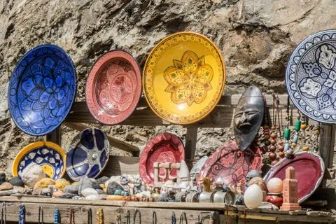 A closeup shot of several plates of different colors and patterns put next to Foto stock