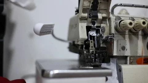 Closeup shot of sewing machine in slow motion Stock Footage 74767253