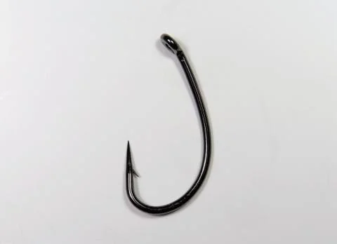 Closeup shot of a sharp metal fishhook 写真素材