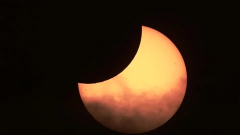 Closeup shot of a shining partial solar eclipse in a night sky Stock Footage 229613358