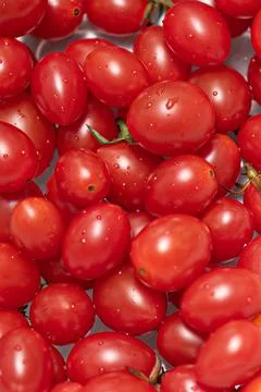 Closeup shot of a stack of juicy red cherry tomatoes. 스톡 사진