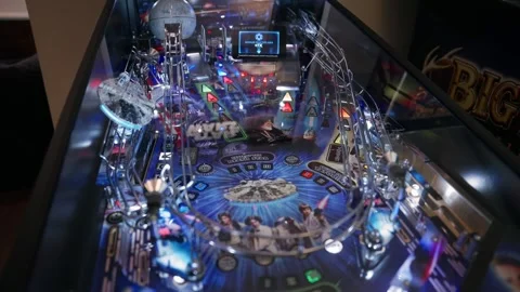 Closeup shot of a Star Wars themed pinball gaming machine Stock Footage 248953974
