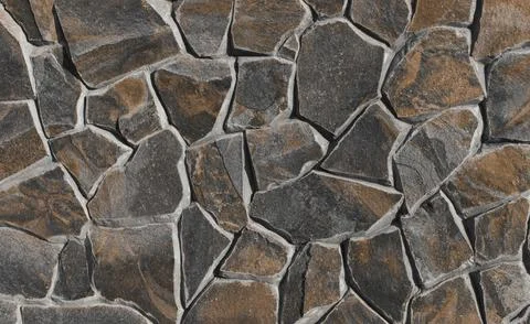 Closeup shot of a stone wall in a random pattern Stock Photos