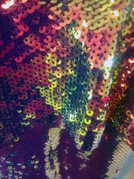 Closeup shot of surface made of multicolored shining circular objects Stock Photos