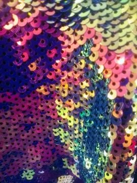 Closeup shot of surface made of multicolored shining circular objects Stock Photos