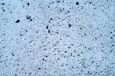 Closeup shot of a textured cement surface background for wallpapers Stock Photos