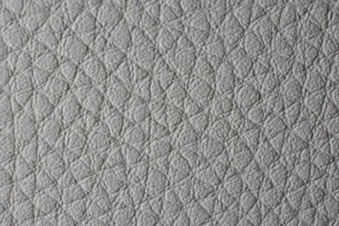 Closeup shot of a textured gray surface Stock Photos