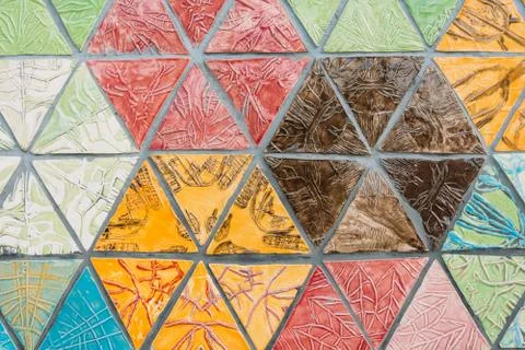 Closeup shot of triangular colorful textured tiles 写真素材