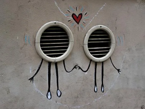 Closeup shot of two round vent holes in a wall with a funny drawing  of them as Stock Illustration
