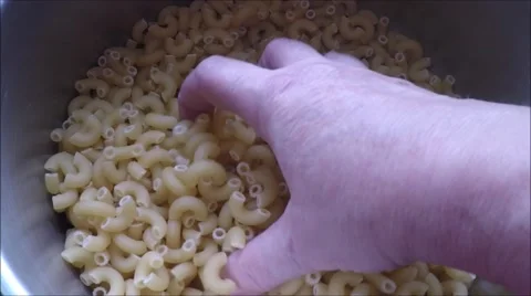 Closeup shot of uncooked raw italian pasta Stock Footage 46991153