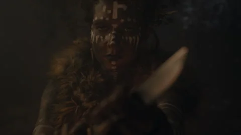 Closeup shot of a voodoo witch cutting her hand Stock Footage 259863467