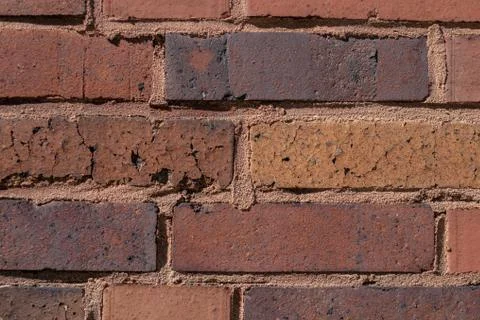 Closeup shot of a wall composed of several rectangular stones Stock Photos