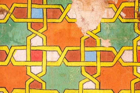 A closeup shot of a wall having different patterns of multiple colors painted Stock Photos