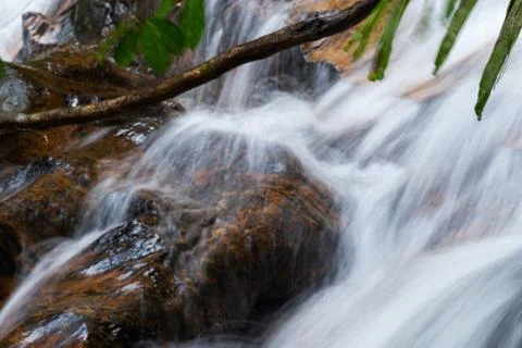 Closeup shot. Waterfall stream down, flowing in the tropical rainforest and w Foto stock