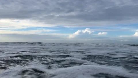 A closeup shot of waves rolling in at Myrtle Beach South Carolina  動画素材 207796434