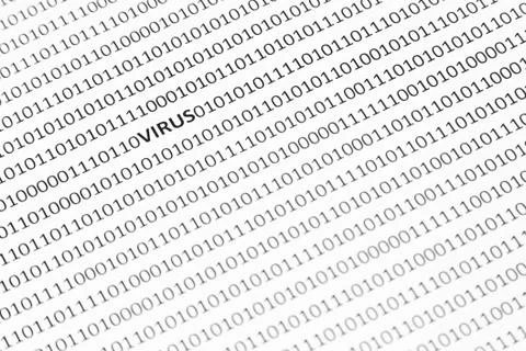 Closeup shot of a white surface with virus and ones and zeros are written on  Stock Photos