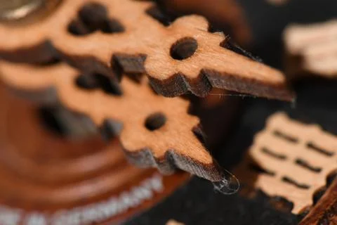 Closeup shot of wooden clock pointers with interesting patterns Foto stock