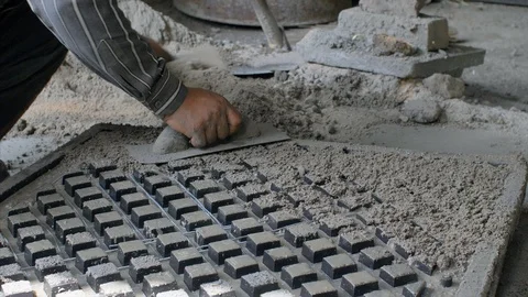 Closeup shot of a worker adding cement to the frame of ventilator Stock-Footage 115317227