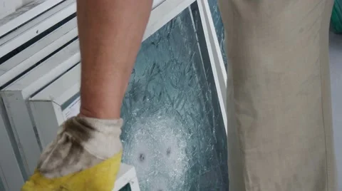 Closeup Shot of Worker`s Hands Replacing Window Frames With Bulletproof Glass Stock Footage 53008016