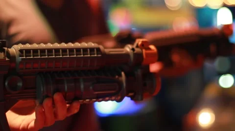 Closeup Side Shot of 2 People Playing Shooting Game Stock Footage 49149012