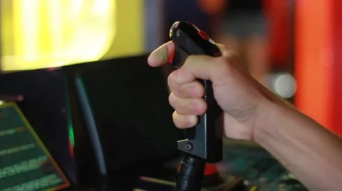 Closeup Side Shot of Person Playing Space Arcade Game Stock Footage 49148035