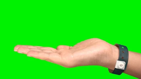 Closeup side view of beautiful outstretched hand isolated on green background Stock Footage 115539111