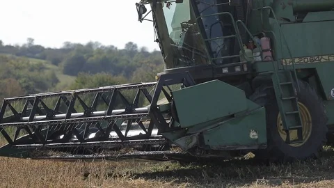 Closeup side view of combine harvester. agriculture machine Stock Footage 122831237