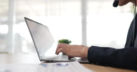 Closeup side view of hands typing on keyboard laptop pc while sitting  Stock Footage 201985351