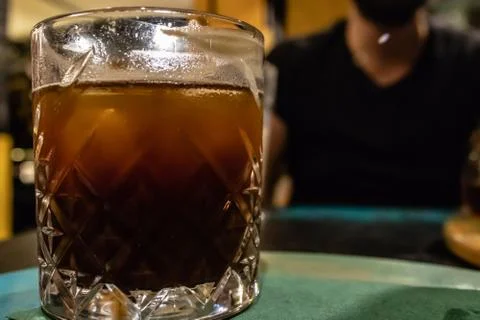 A closeup side view shoot of a cup of iced coffee Stock Photos