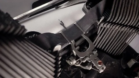 Closeup side view on typing text "typewriter" with batwing typewriter. Stock Footage 89306685